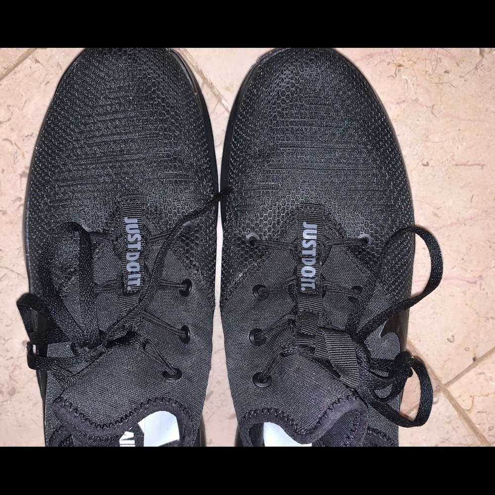 All black Womens Nike. Size 8.5.